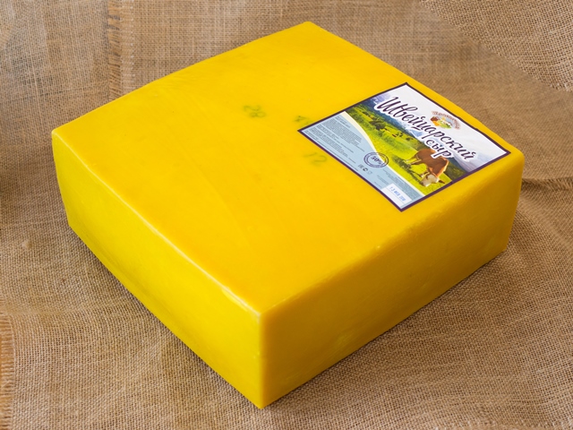 Швейцарский сыр полутвердрый ТМ "Красногорье" мдж 50% парафин - 16-17 кг блок